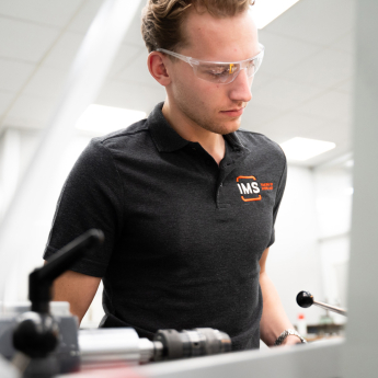 System Integrator working on Grinding Bench