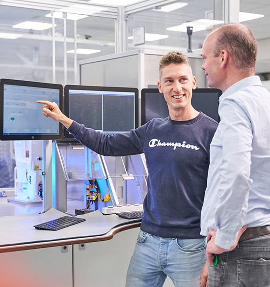 Engineer and technical sales manager discussing